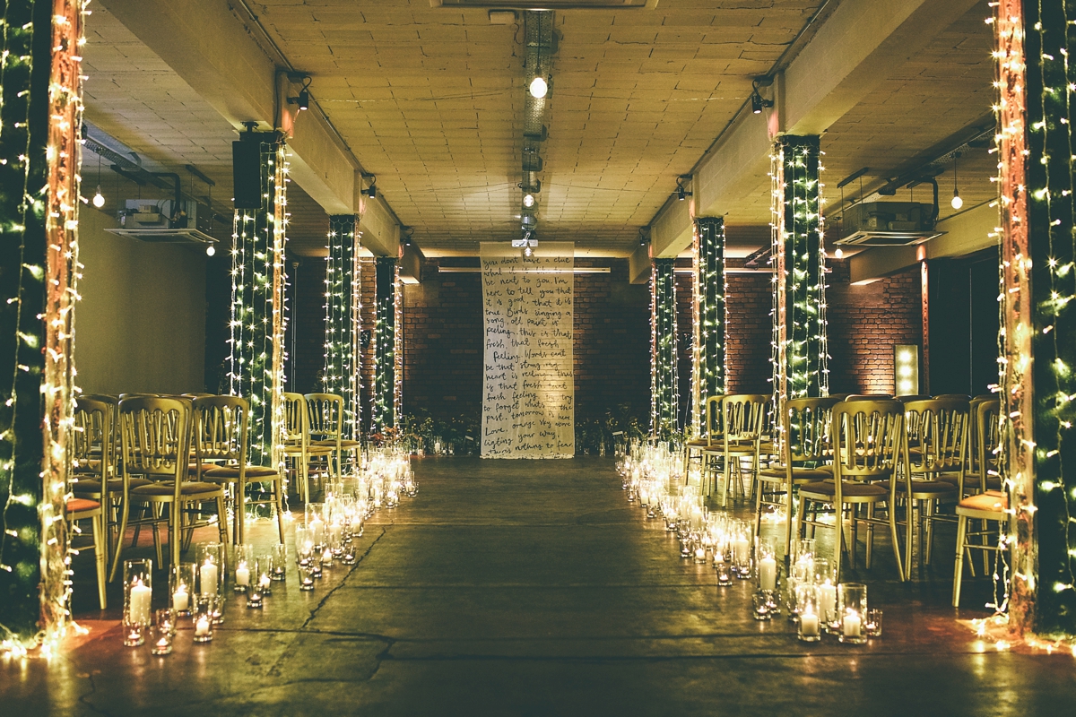 18 A bride in a selfmade jumpsuit for her industrial warehouse wedding in Manchester