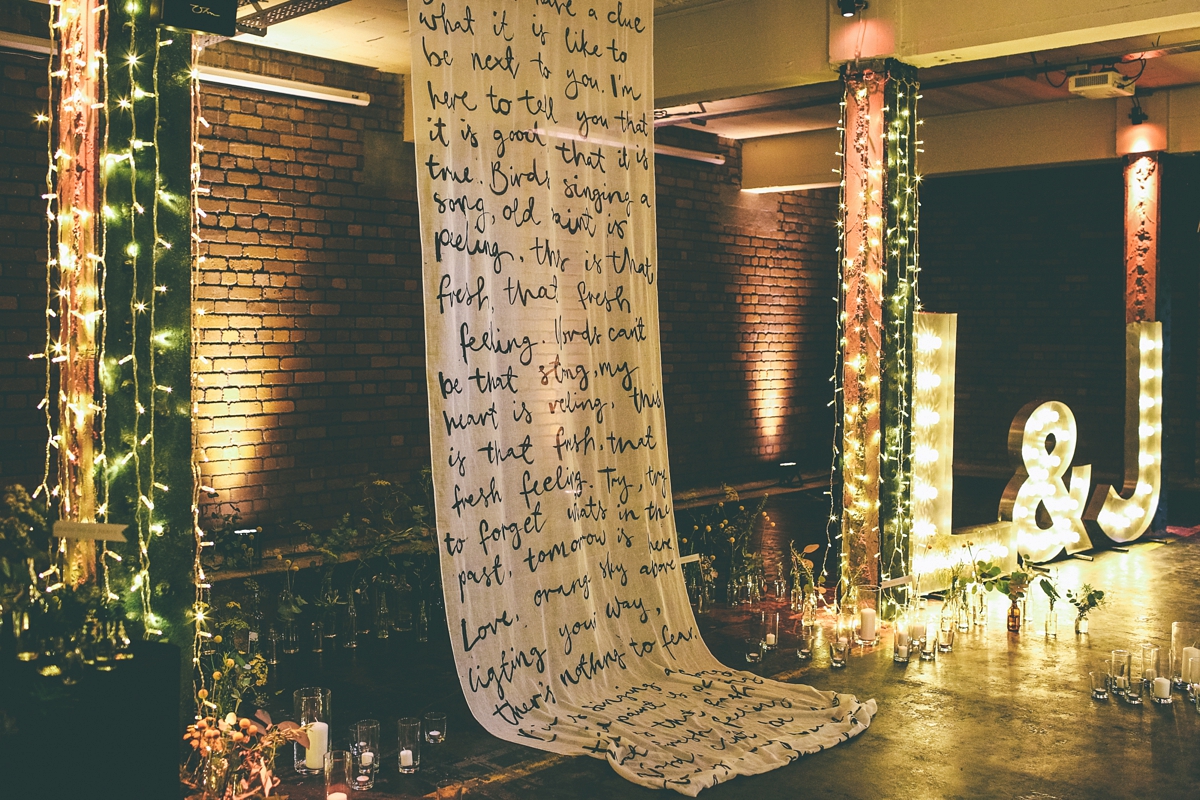 23 A bride in a selfmade jumpsuit for her industrial warehouse wedding in Manchester