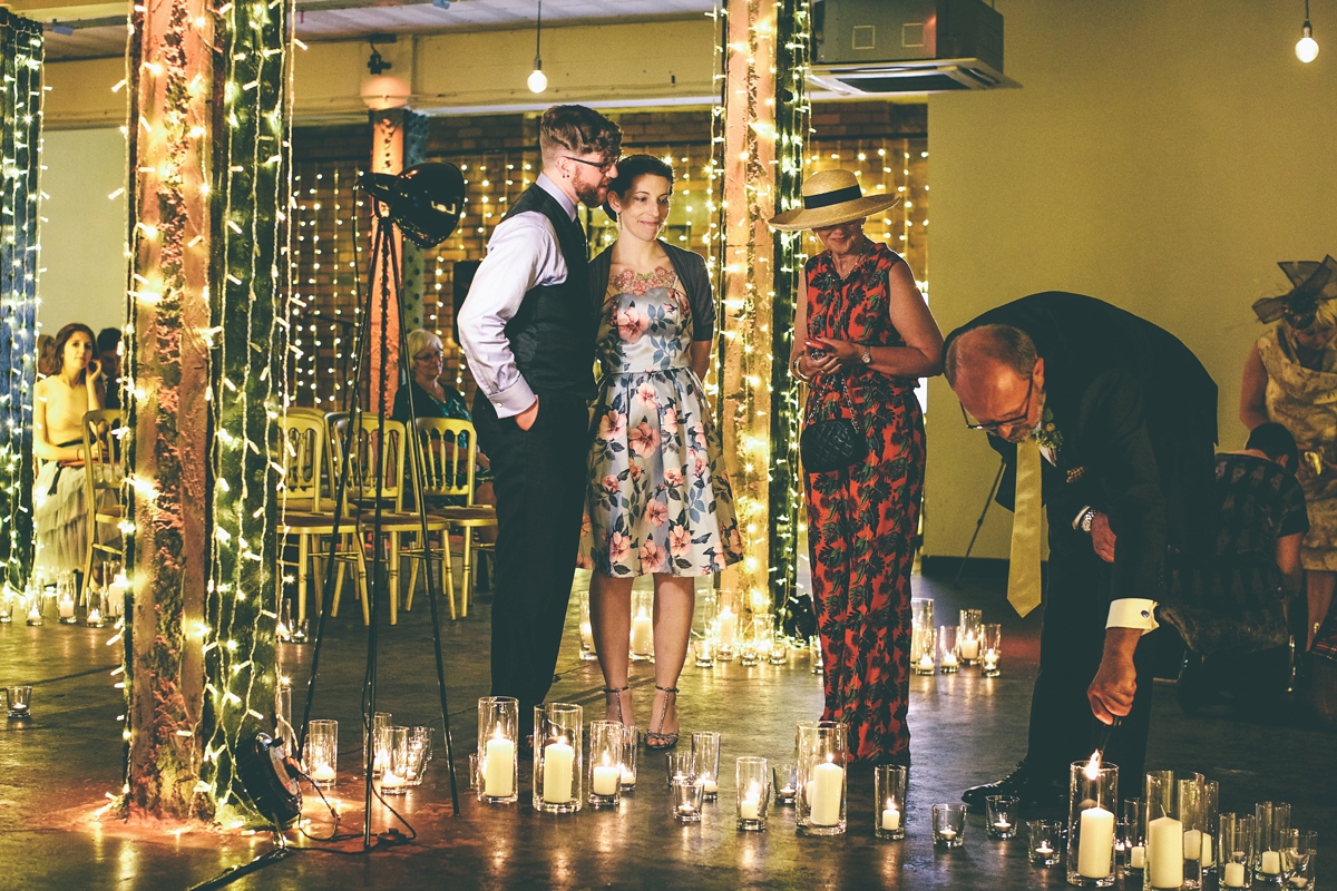 24 A bride in a selfmade jumpsuit for her industrial warehouse wedding in Manchester