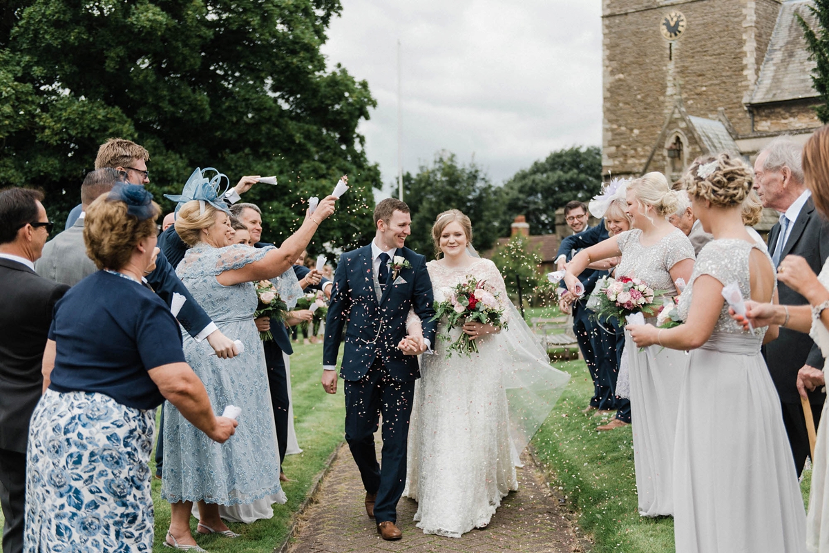 24 A bride who made her own dress for her elegant garden party wedding