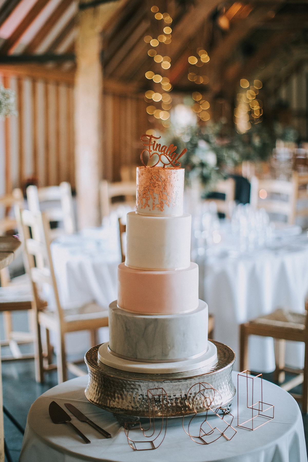 25 Paloma de Blanca dress copper peach and grey barn wedding