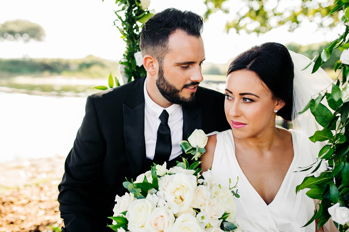 27 A Charlie Brear dress for a timeless Beachside wedding in greens and neutrals