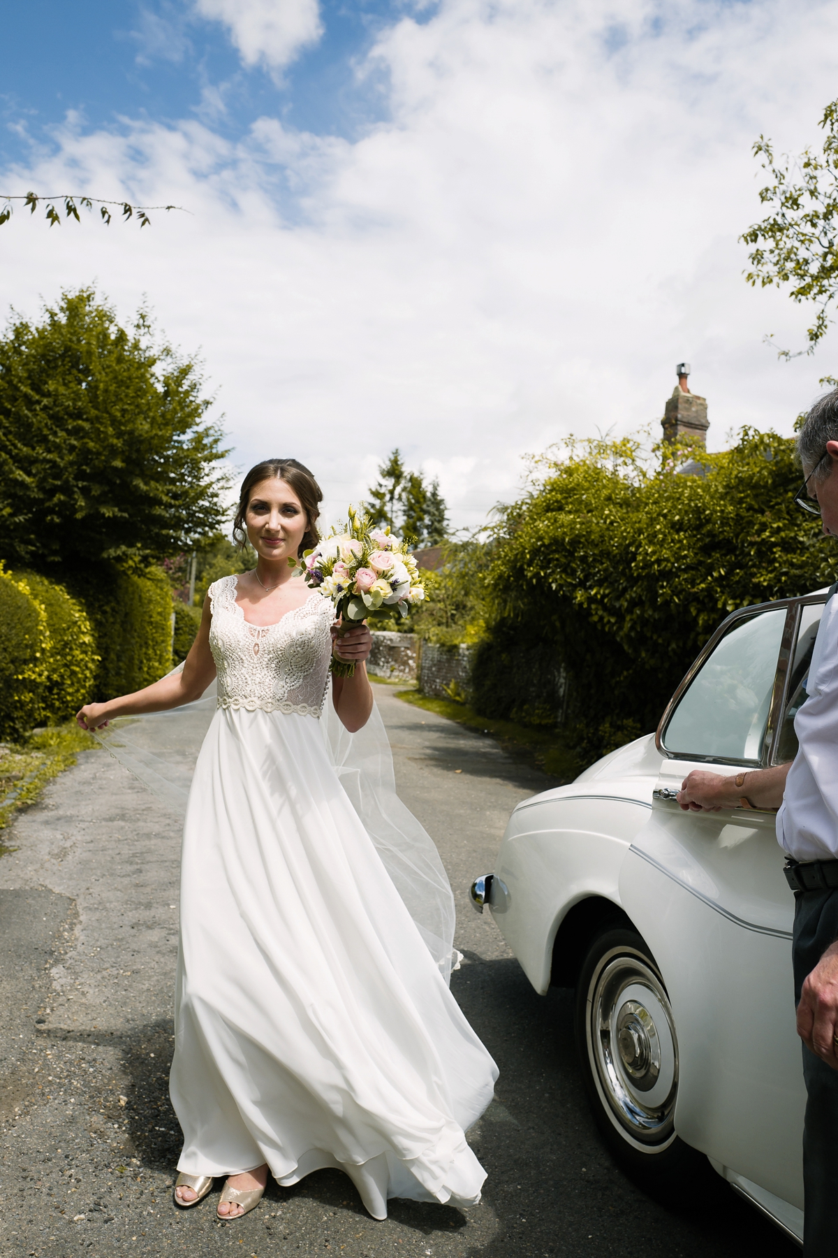 28 A Flora wedding dress for a family wedding in the countryside