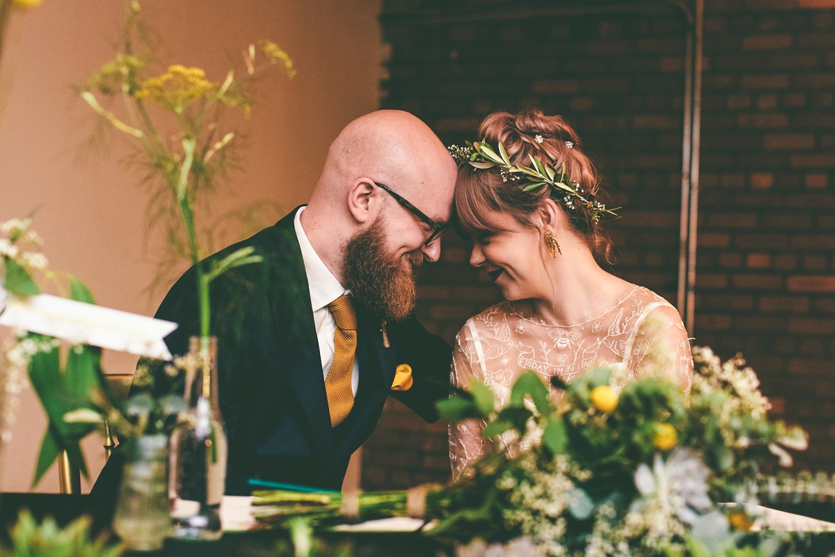 28 A bride in a selfmade jumpsuit for her industrial warehouse wedding in Manchester