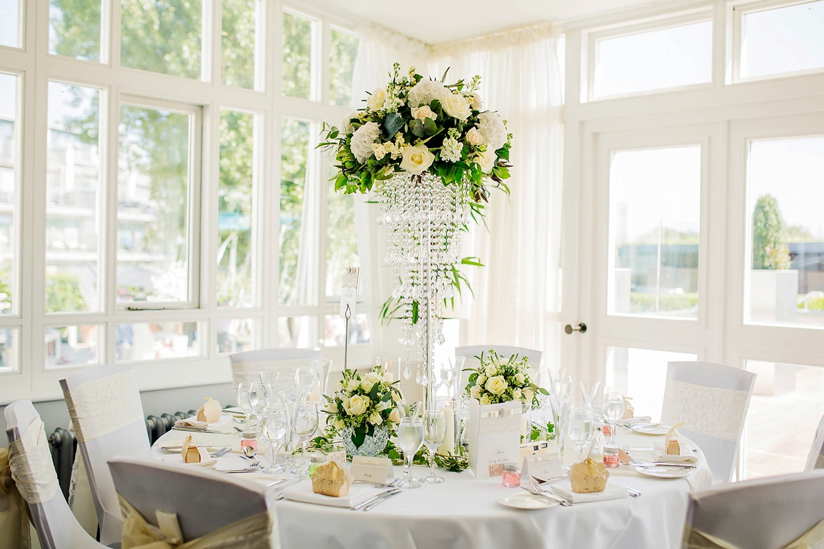 29 A Charlie Brear dress for a timeless Beachside wedding in greens and neutrals