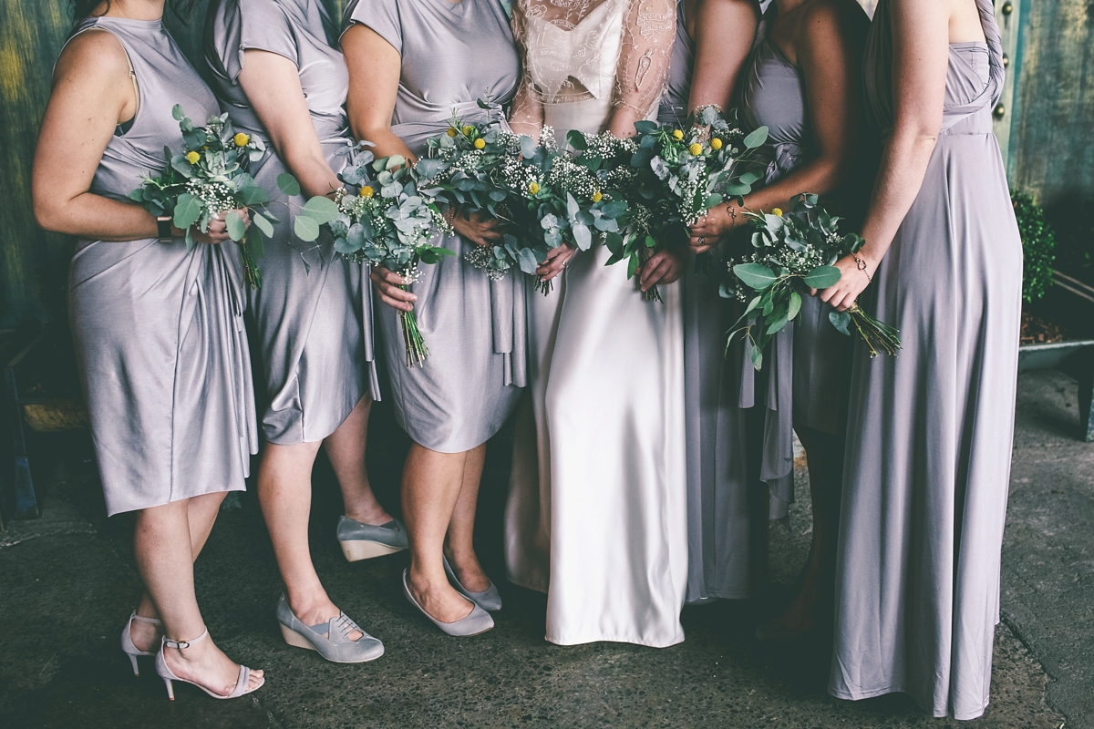 33 A bride in a selfmade jumpsuit for her industrial warehouse wedding in Manchester