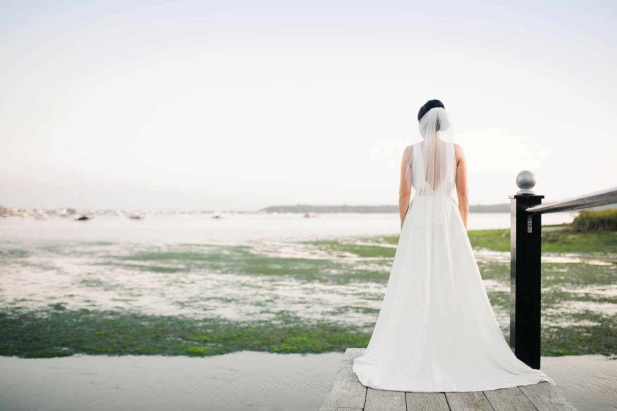 35 A Charlie Brear dress for a timeless Beachside wedding in greens and neutrals