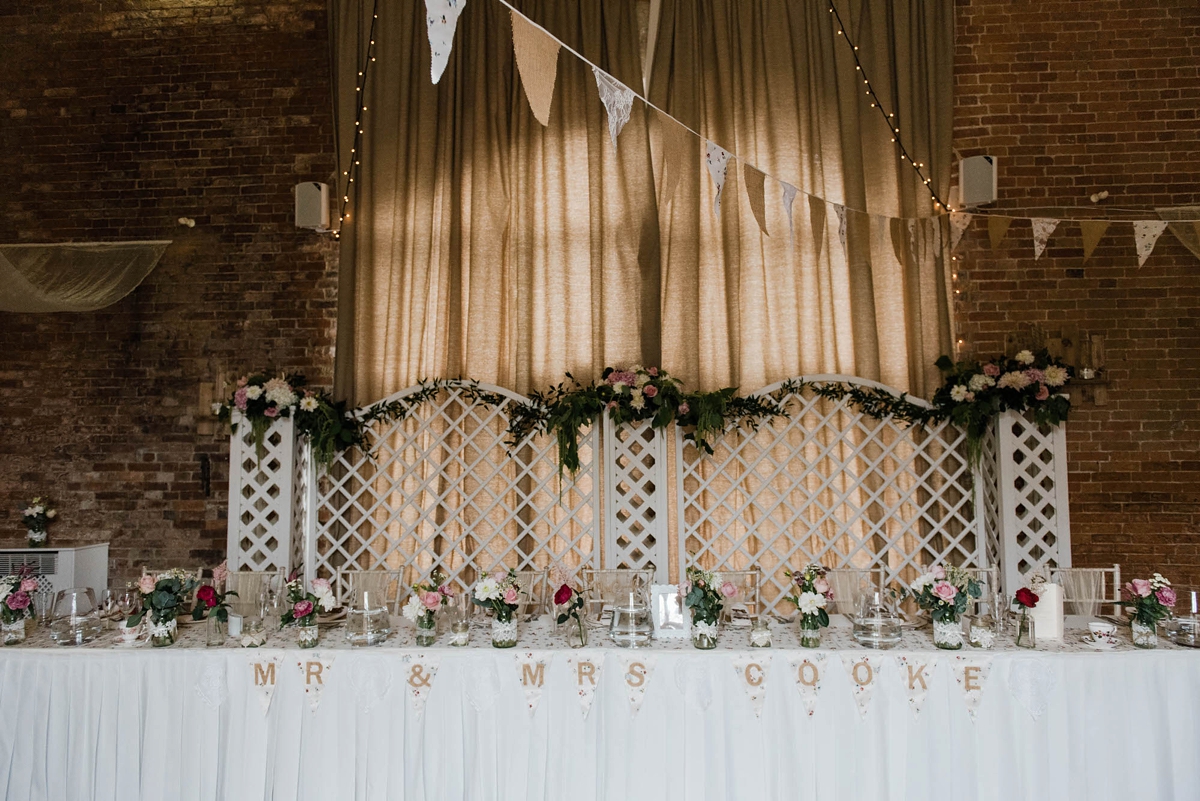 36 A bride who made her own dress for her elegant garden party wedding