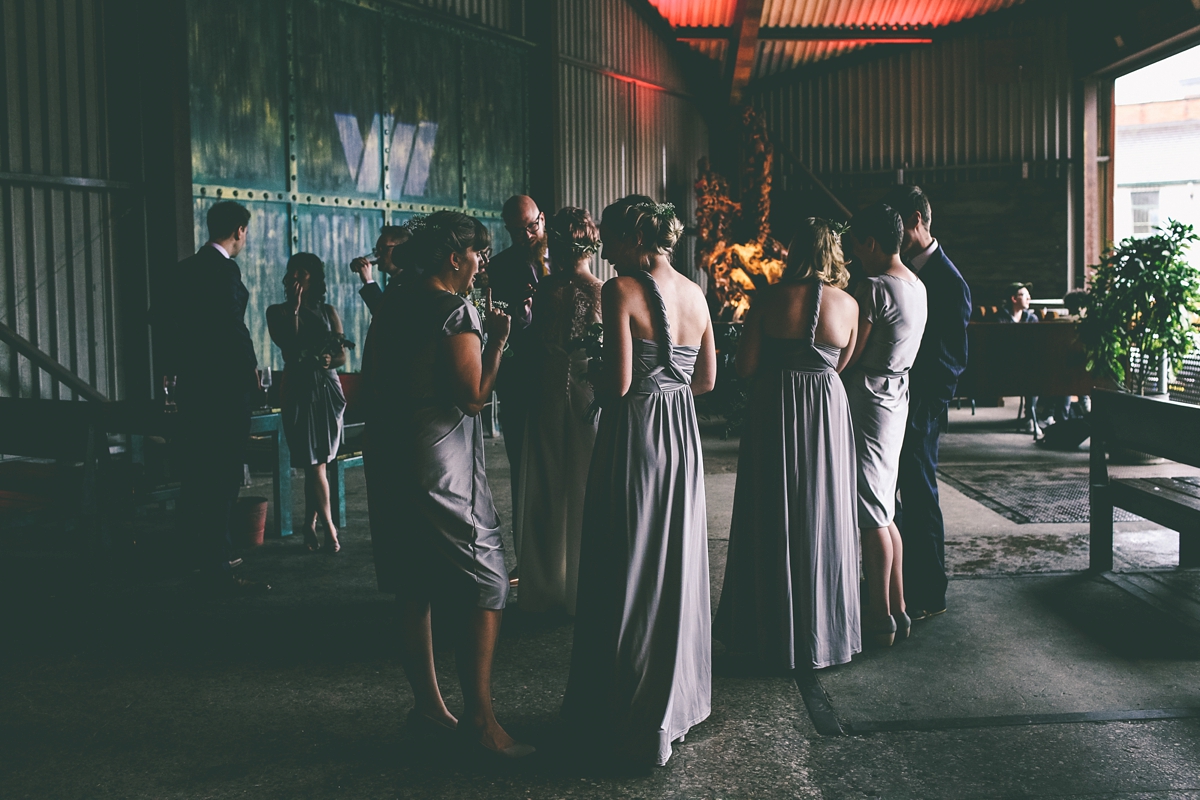 37 A bride in a selfmade jumpsuit for her industrial warehouse wedding in Manchester