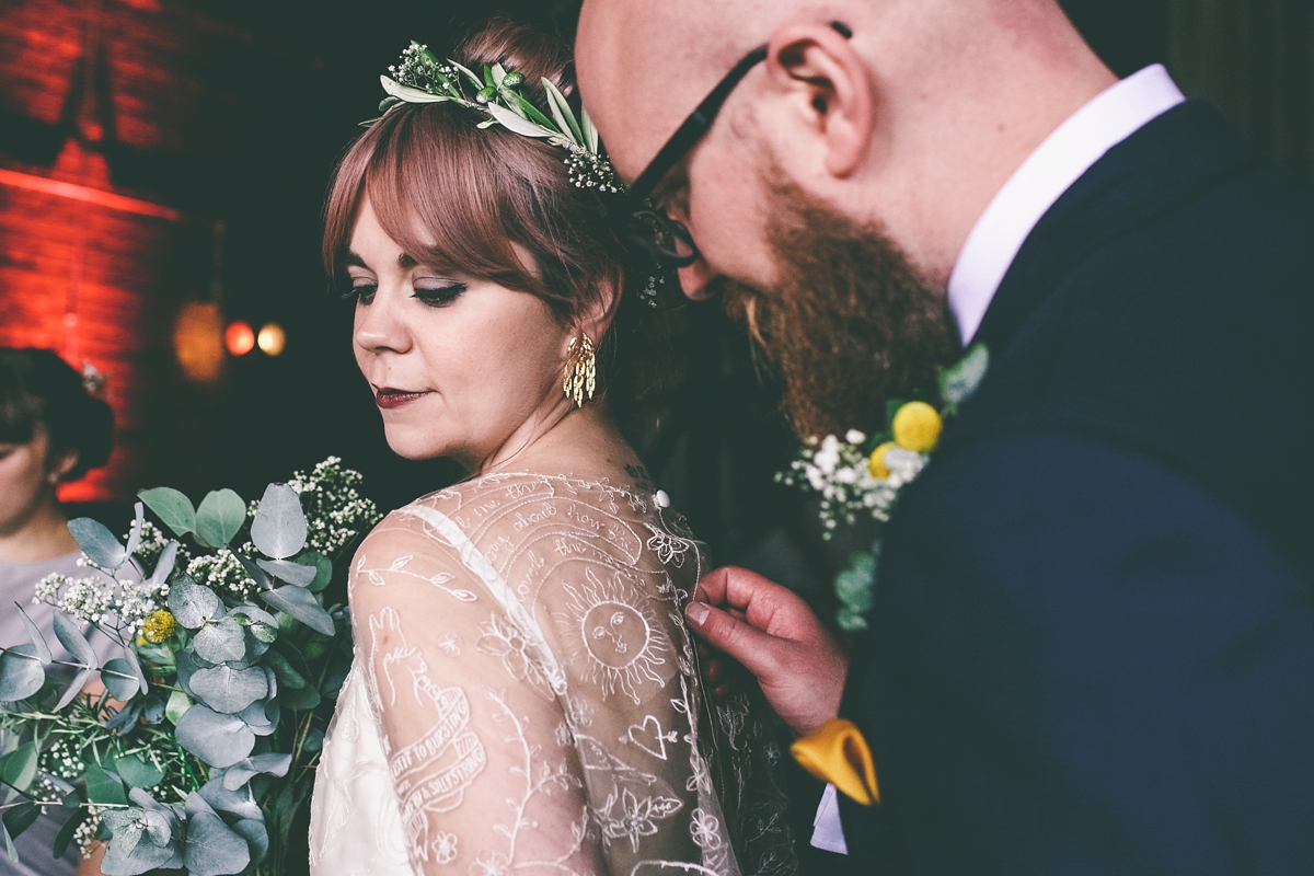 38 A bride in a selfmade jumpsuit for her industrial warehouse wedding in Manchester