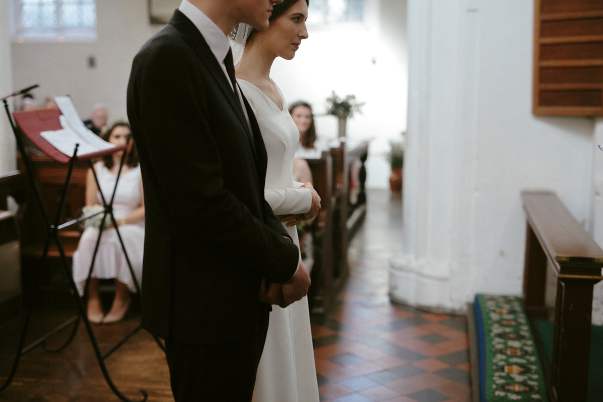 39 A bespoke long sleeved dress and vintage Whistles coat for an effotlessly elegant Cambridge wedding