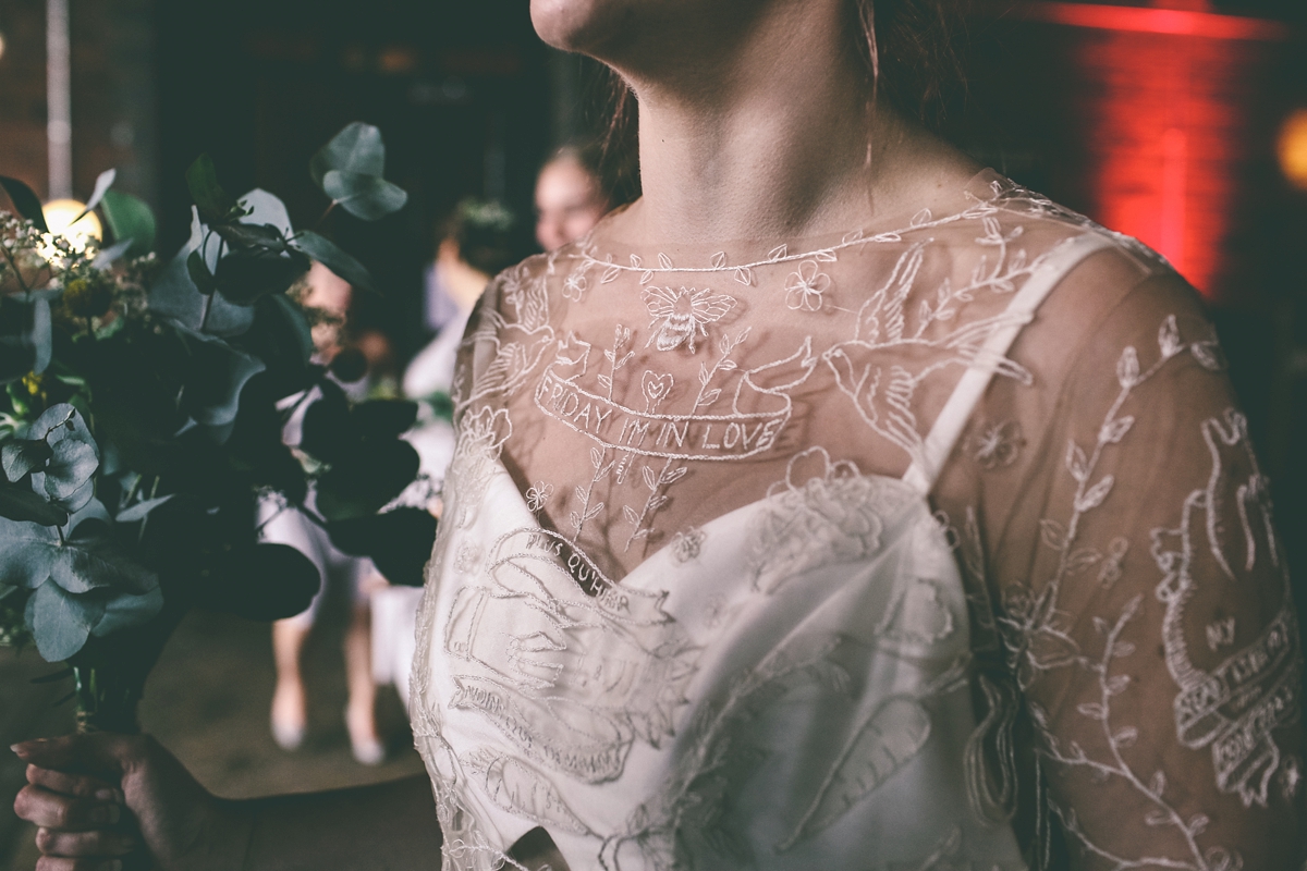 39 A bride in a selfmade jumpsuit for her industrial warehouse wedding in Manchester