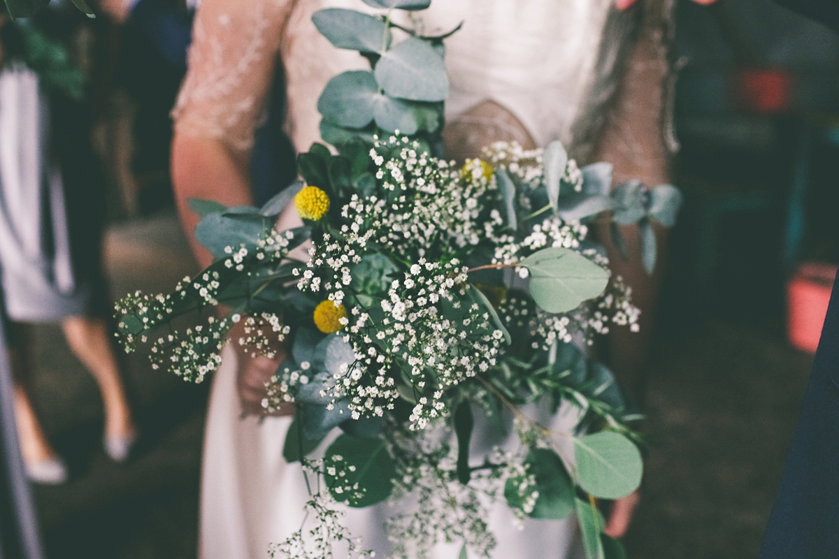 40 A bride in a selfmade jumpsuit for her industrial warehouse wedding in Manchester