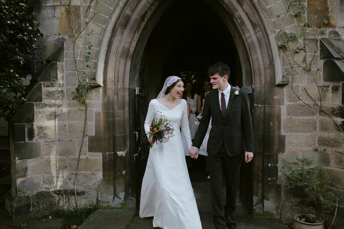 42 A bespoke long sleeved dress and vintage Whistles coat for an effotlessly elegant Cambridge wedding