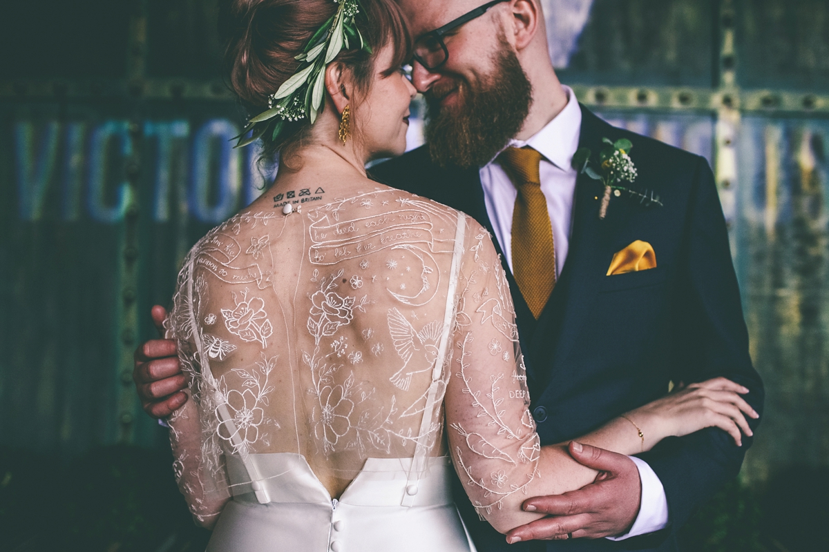 42 A bride in a selfmade jumpsuit for her industrial warehouse wedding in Manchester