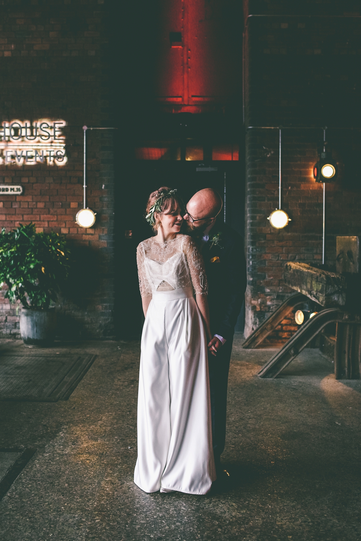 43 A bride in a selfmade jumpsuit for her industrial warehouse wedding in Manchester