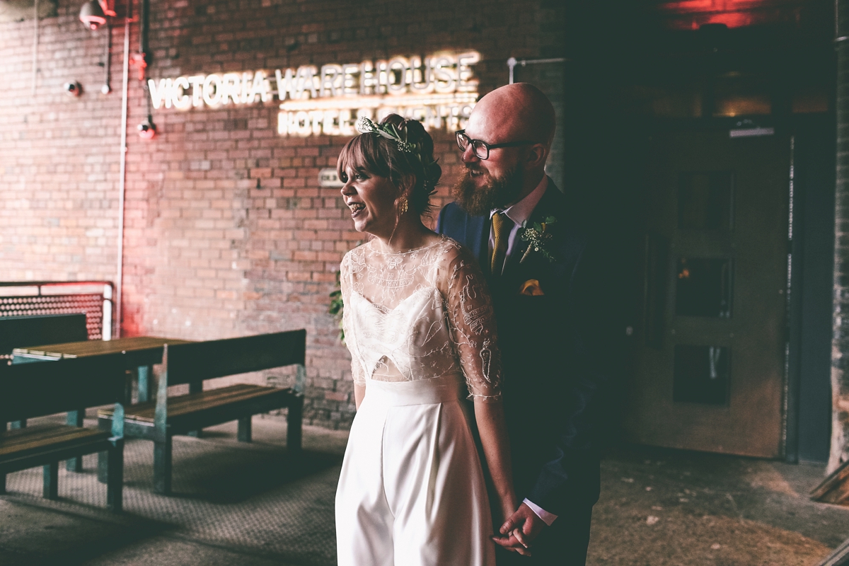 44 A bride in a selfmade jumpsuit for her industrial warehouse wedding in Manchester