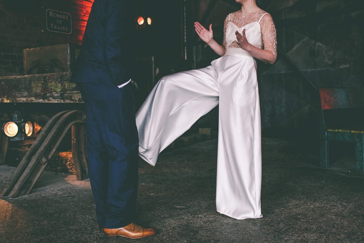 45 A bride in a selfmade jumpsuit for her industrial warehouse wedding in Manchester