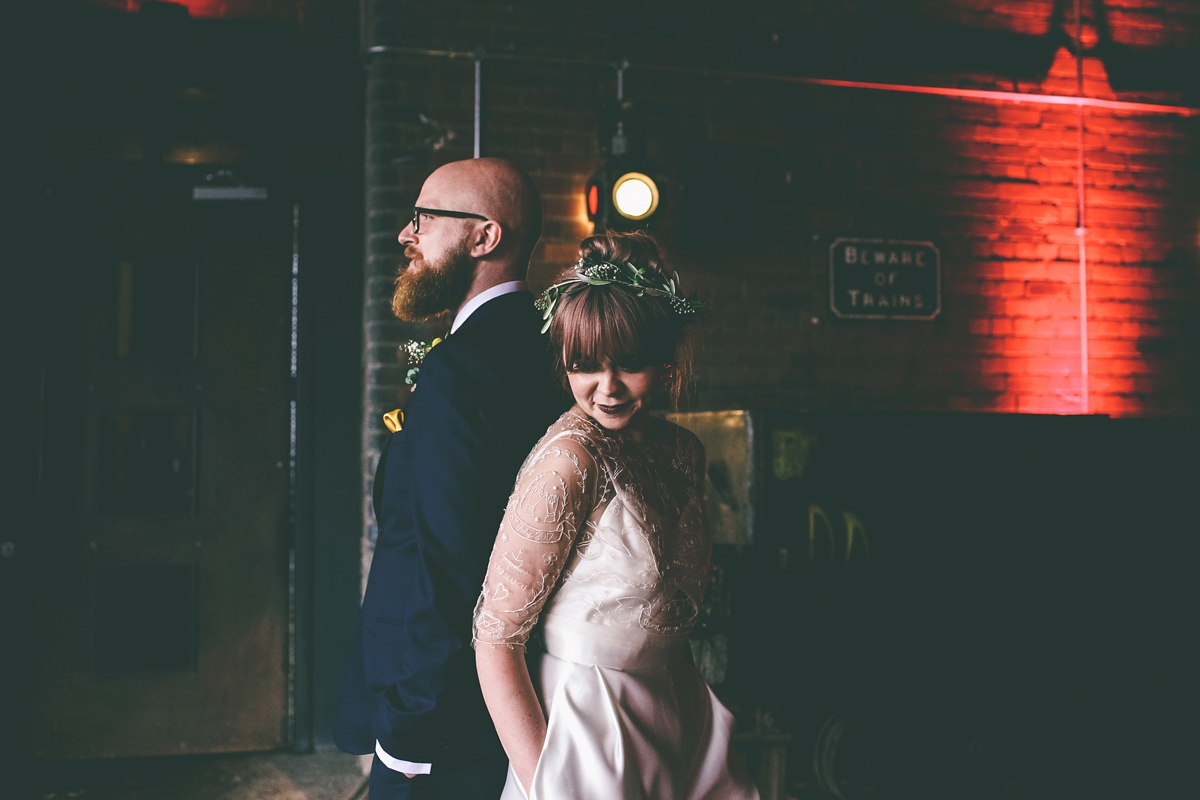 46 A bride in a selfmade jumpsuit for her industrial warehouse wedding in Manchester