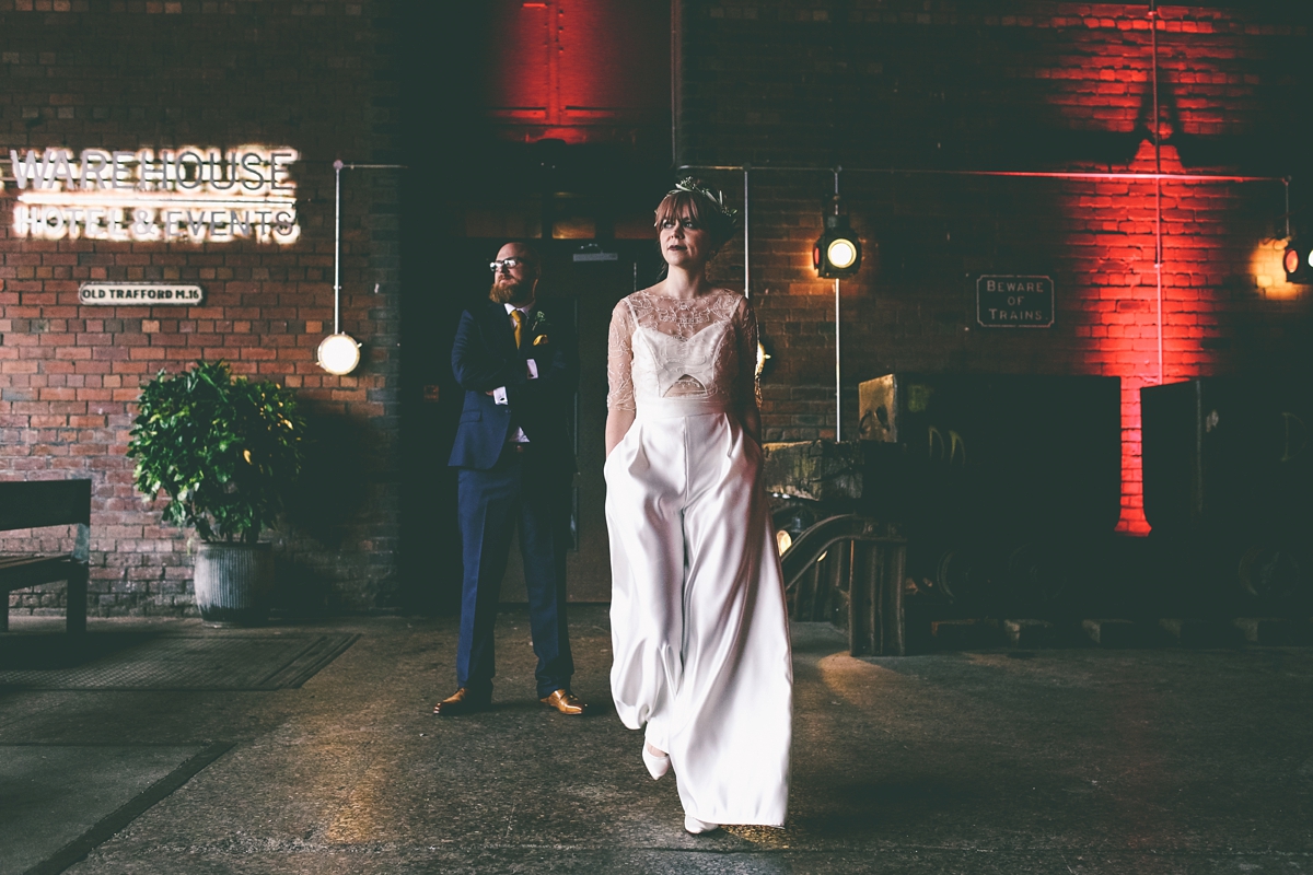 48 A bride in a selfmade jumpsuit for her industrial warehouse wedding in Manchester