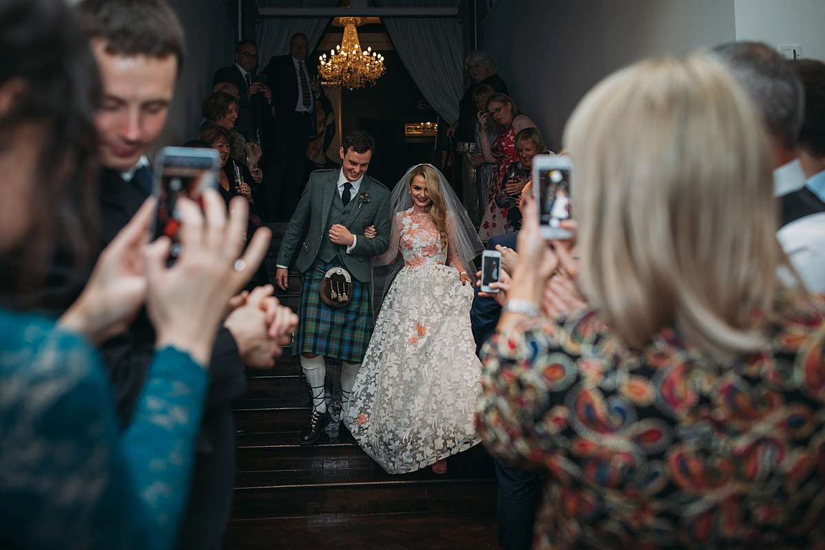 56 A Jesus Peiro dress with hints of peach for a Scottish castle wedding