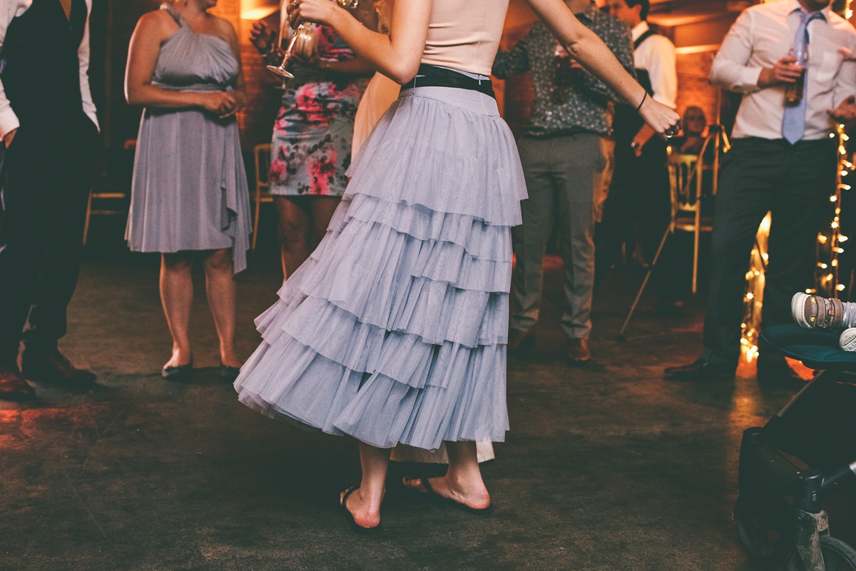 59 A bride in a selfmade jumpsuit for her industrial warehouse wedding in Manchester