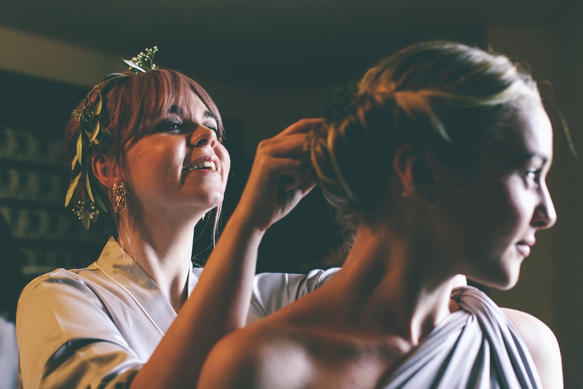 9 A bride in a selfmade jumpsuit for her industrial warehouse wedding in Manchester