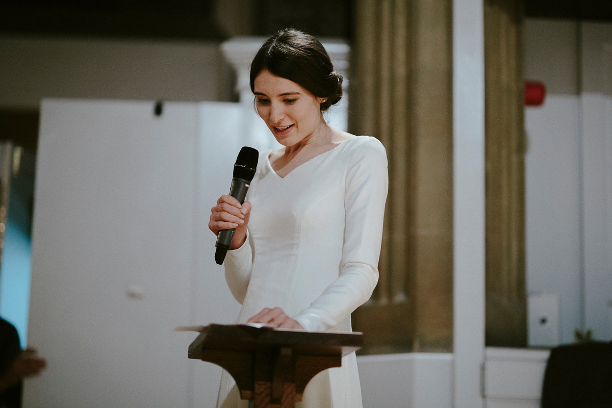 Bride giving a speech at her own wedding