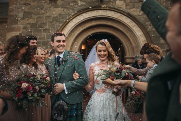 A High Collar, Lace and Long Sleeved Jesus Peiro gown for a Glamorous Scottish Castle Wedding