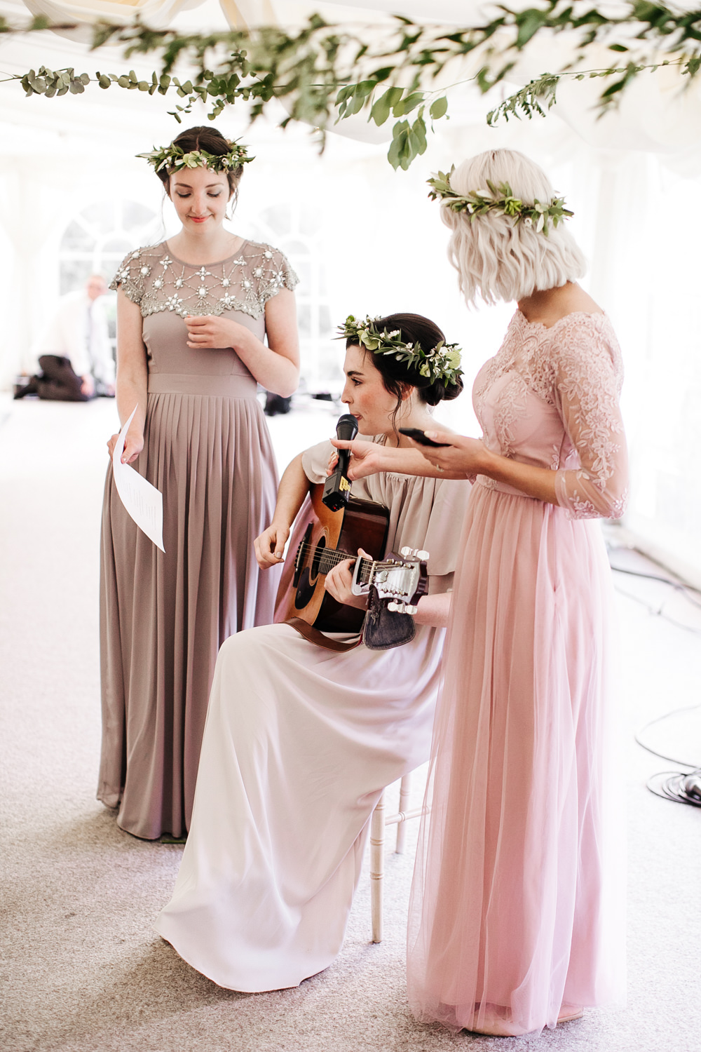 00 singing bridesmaids wearing pink dresses