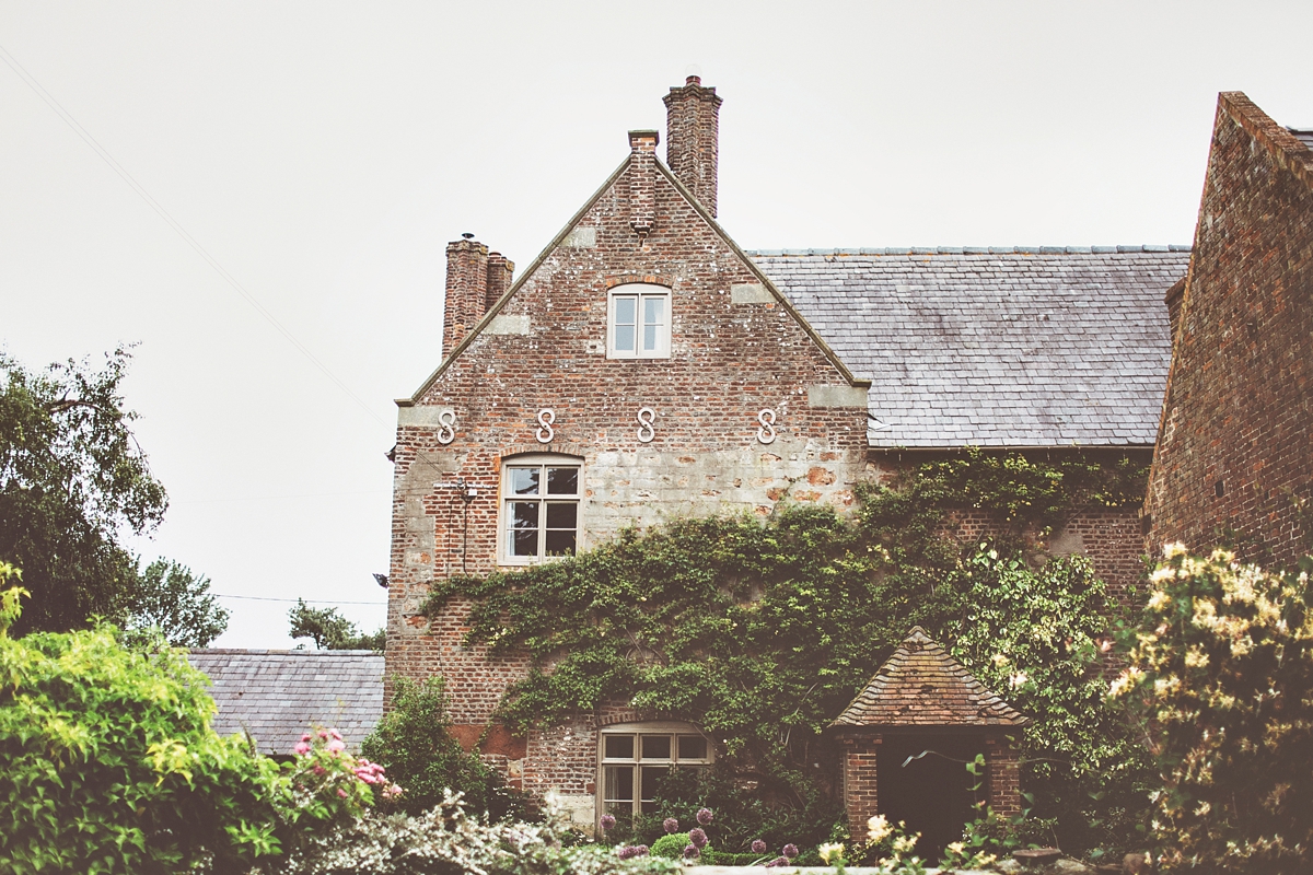 1 A Flora bride dress for a natural and rustic barn wedding in Shropshire