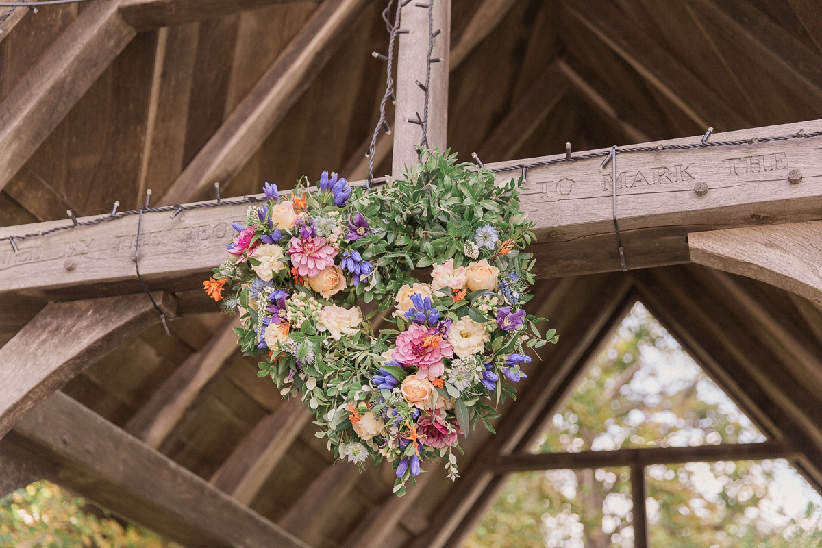 10 A Raimon Bundo dress for a DIY colourful and charming barn wedding