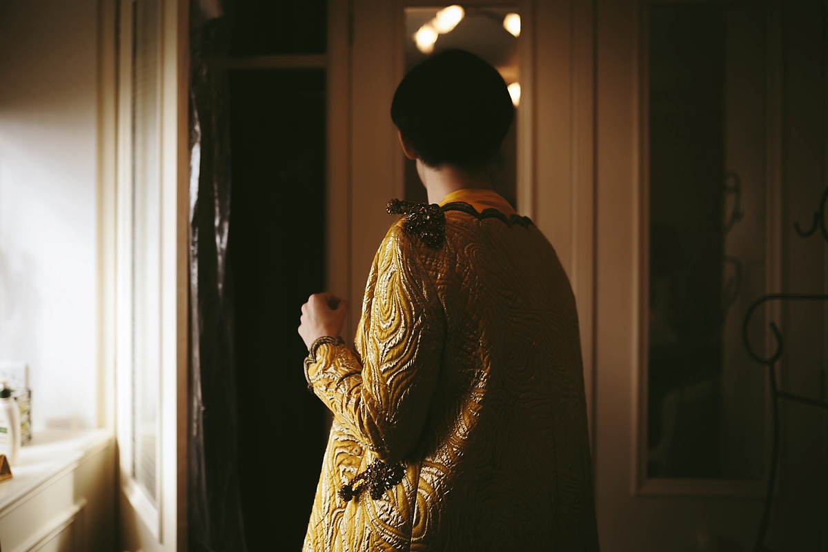 10 A yellow 1970s vintage Christian Dior gown and cape for a modern alternative Scottish wedding