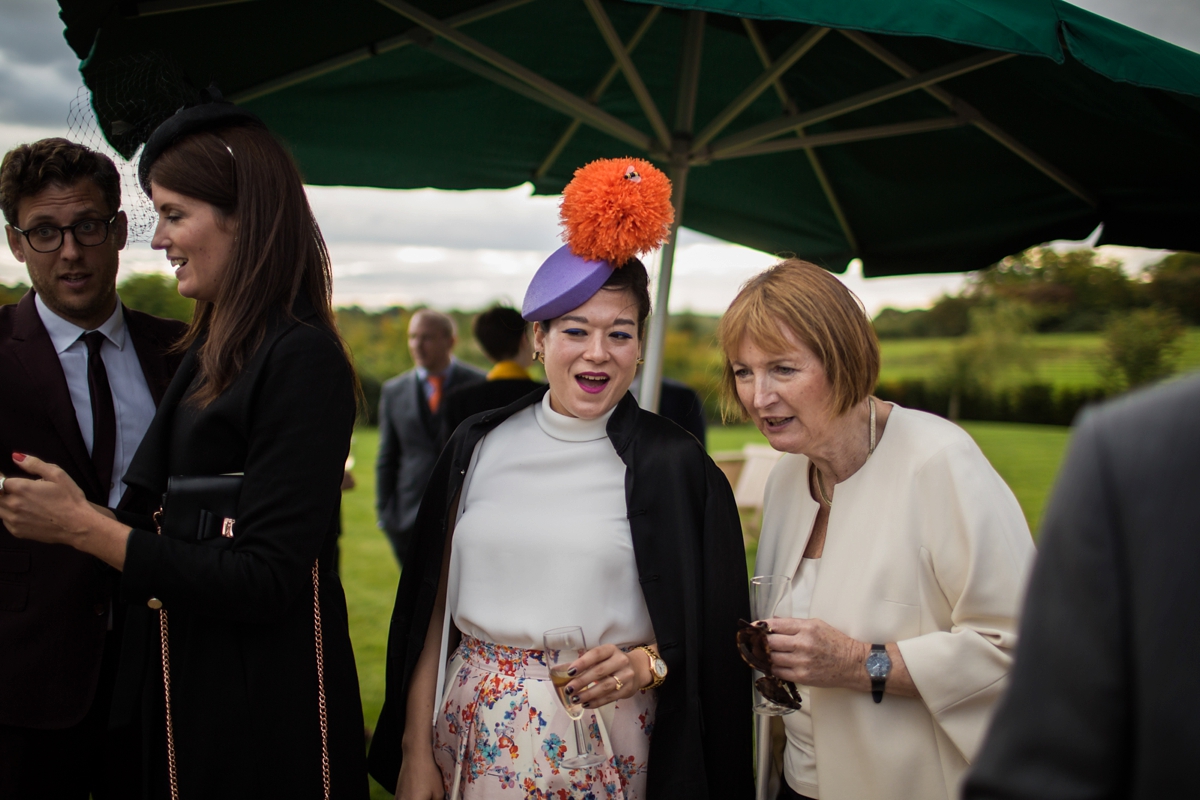 12 A Halfpenny London bride and her feathered skirt and Autumnal Suffolk wedding