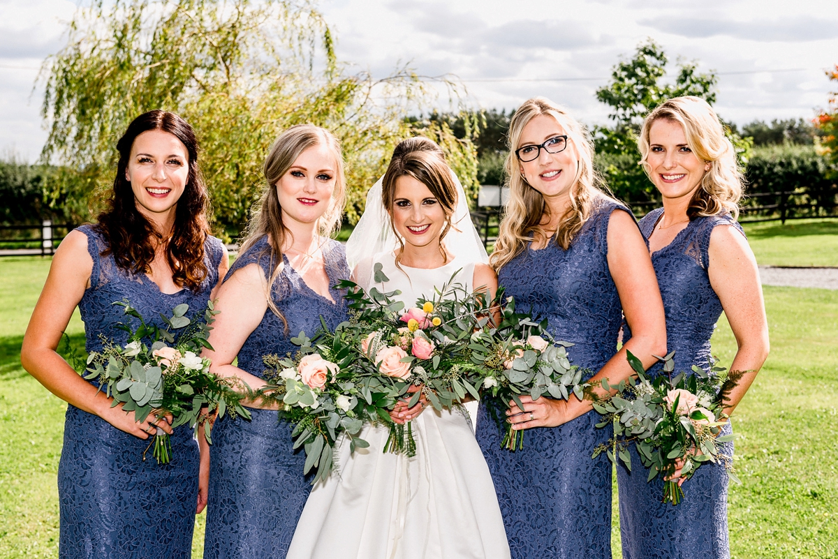 13 A Pronovias backless gownf or a simple relaxed barn wedding