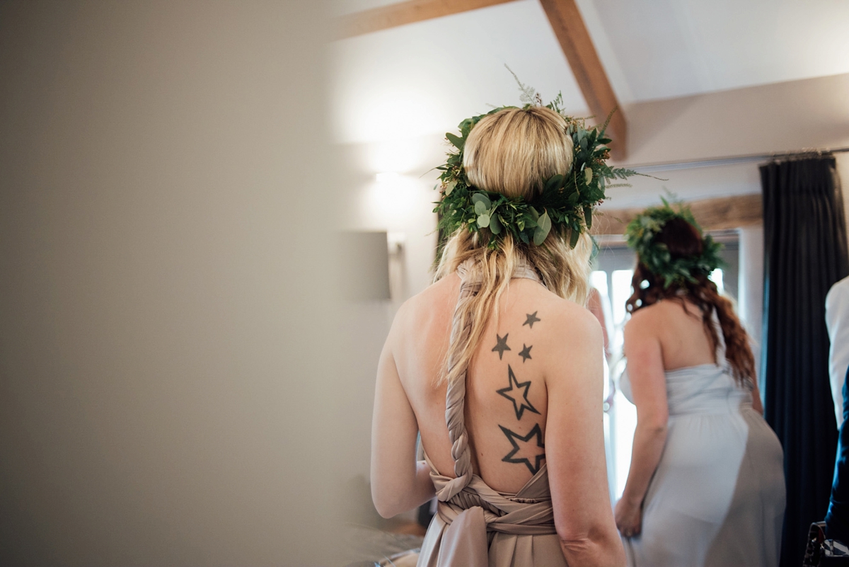 13 A Rembo Styling gown and leather jacket for a winter barn wedding in Cornwall