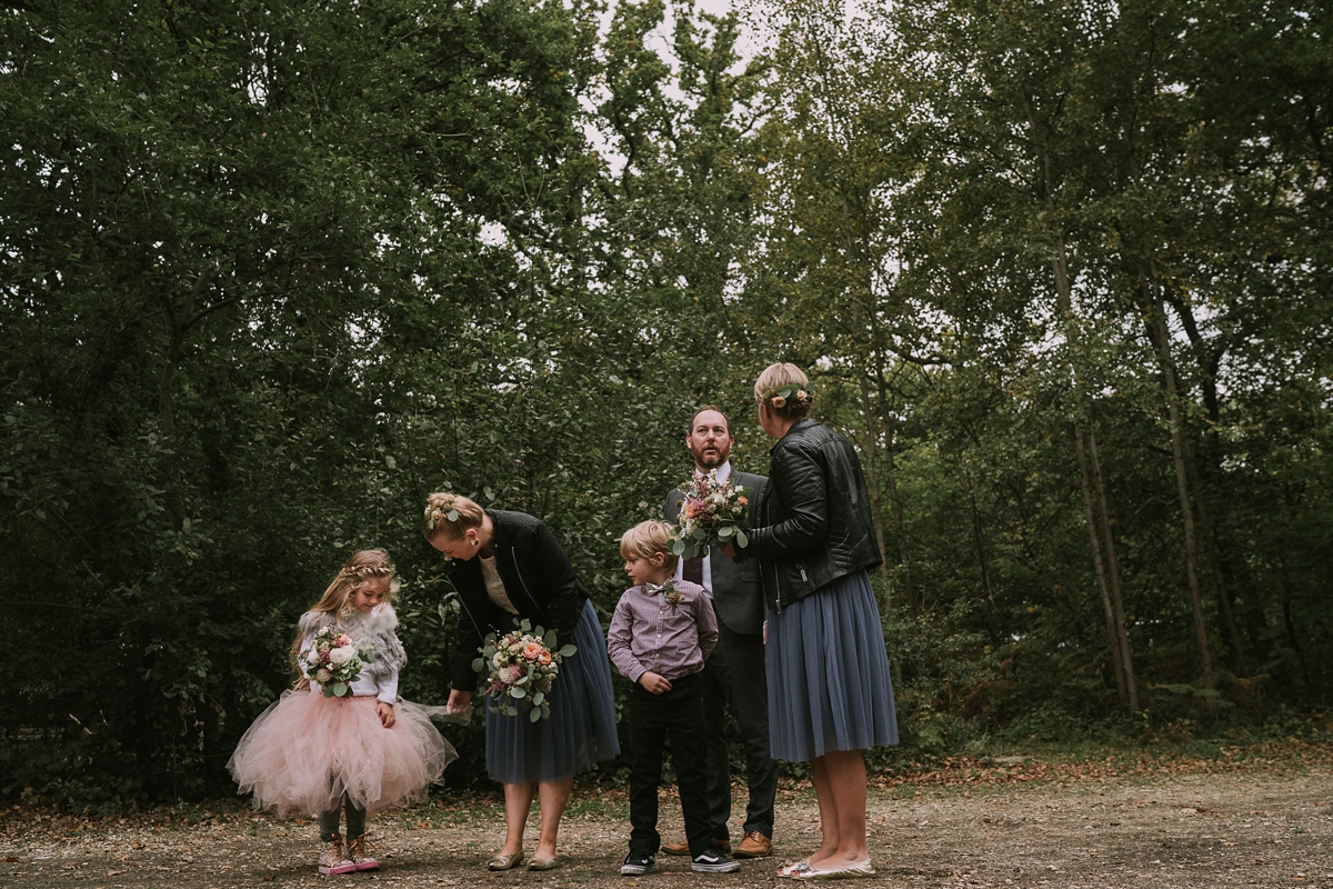 13 A bride wearing a Moonsoon dress for her treetop Autumn wedding