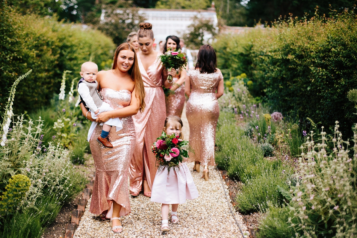 13 An Essense of Australia gown and bridesmaids in gold sequin gowns