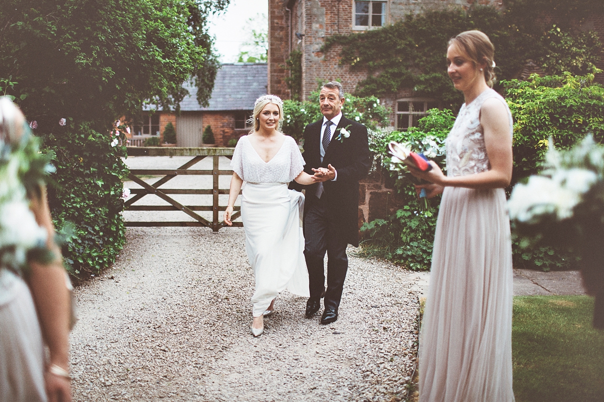 14 A Flora bride dress for a natural and rustic barn wedding in Shropshire