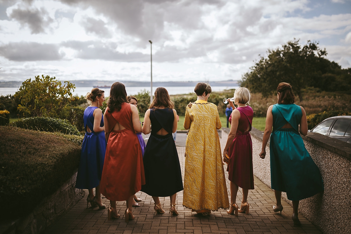 15 A yellow 1970s vintage Christian Dior gown and cape for a modern alternative Scottish wedding