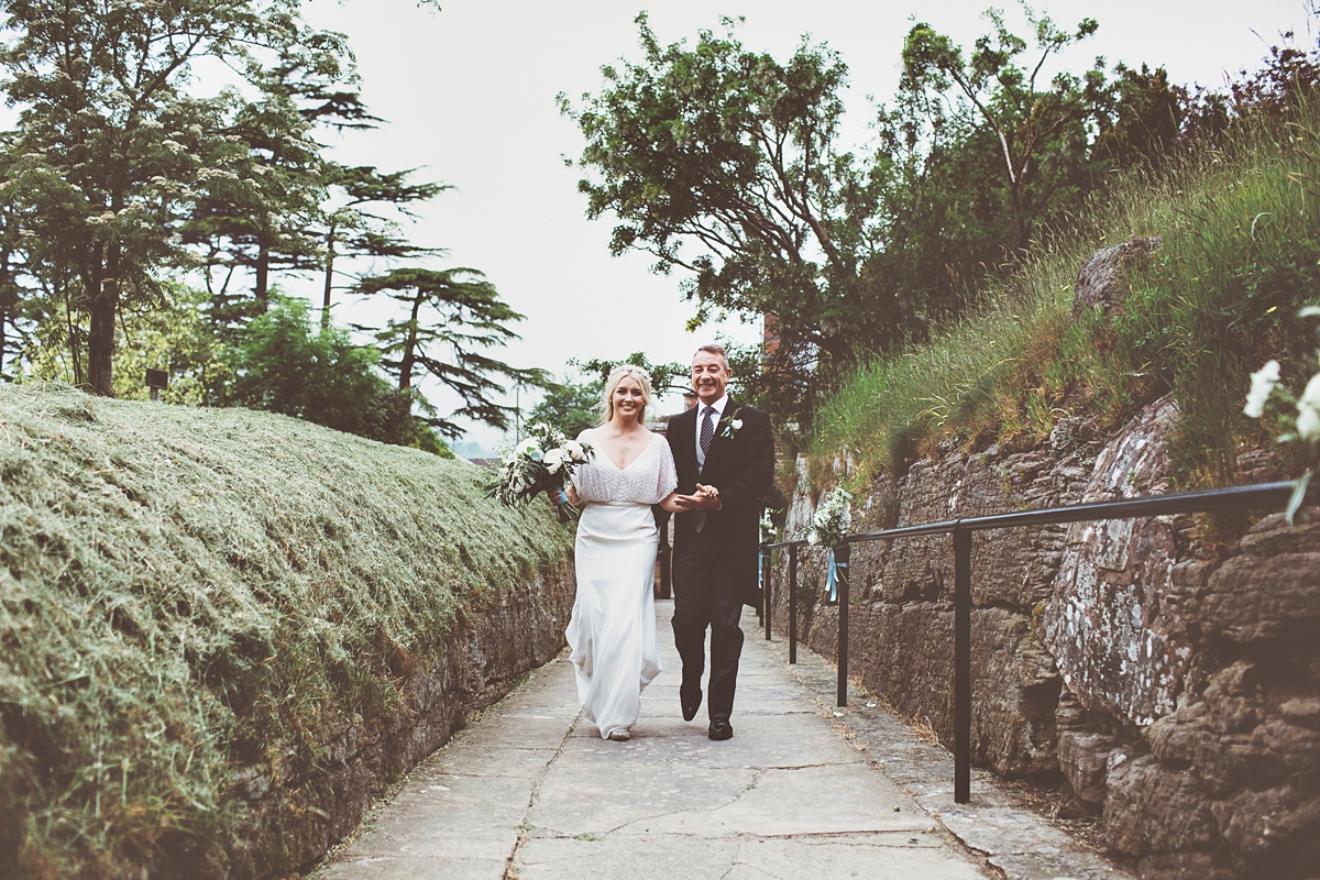 16 A Flora bride dress for a natural and rustic barn wedding in Shropshire