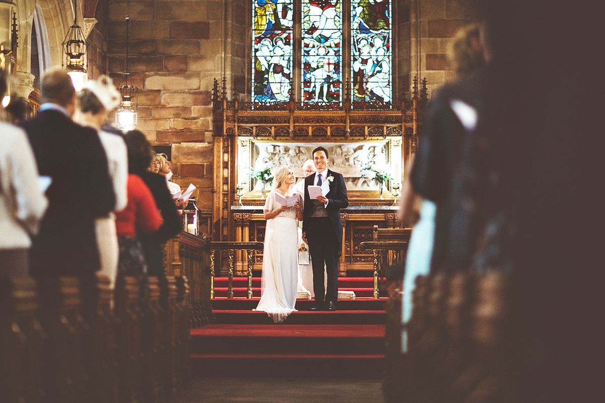 19 A Flora bride dress for a natural and rustic barn wedding in Shropshire