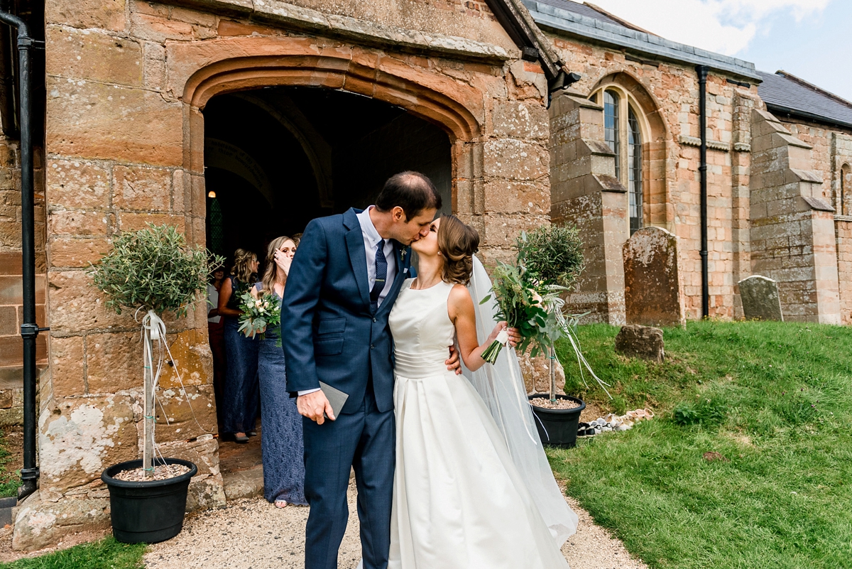 19 A Pronovias backless gownf or a simple relaxed barn wedding