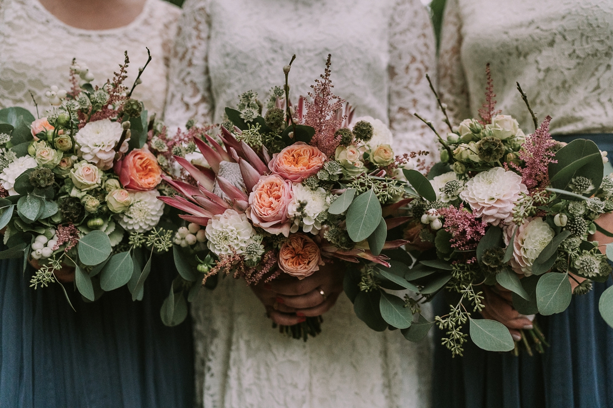 20 A bride wearing a Moonsoon dress for her treetop Autumn wedding