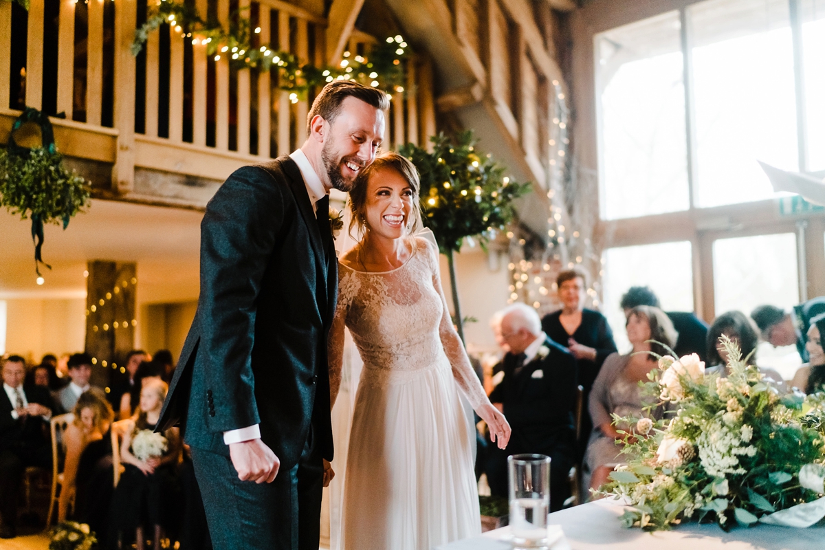 21 An Anna Kara dress for a winter barn wedding in greens and neutrals