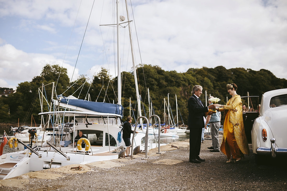 22 A yellow 1970s vintage Christian Dior gown and cape for a modern alternative Scottish wedding