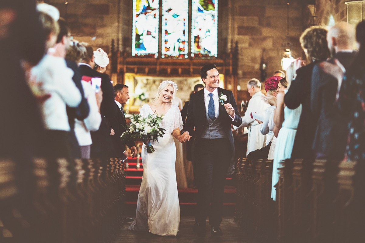 23 A Flora bride dress for a natural and rustic barn wedding in Shropshire