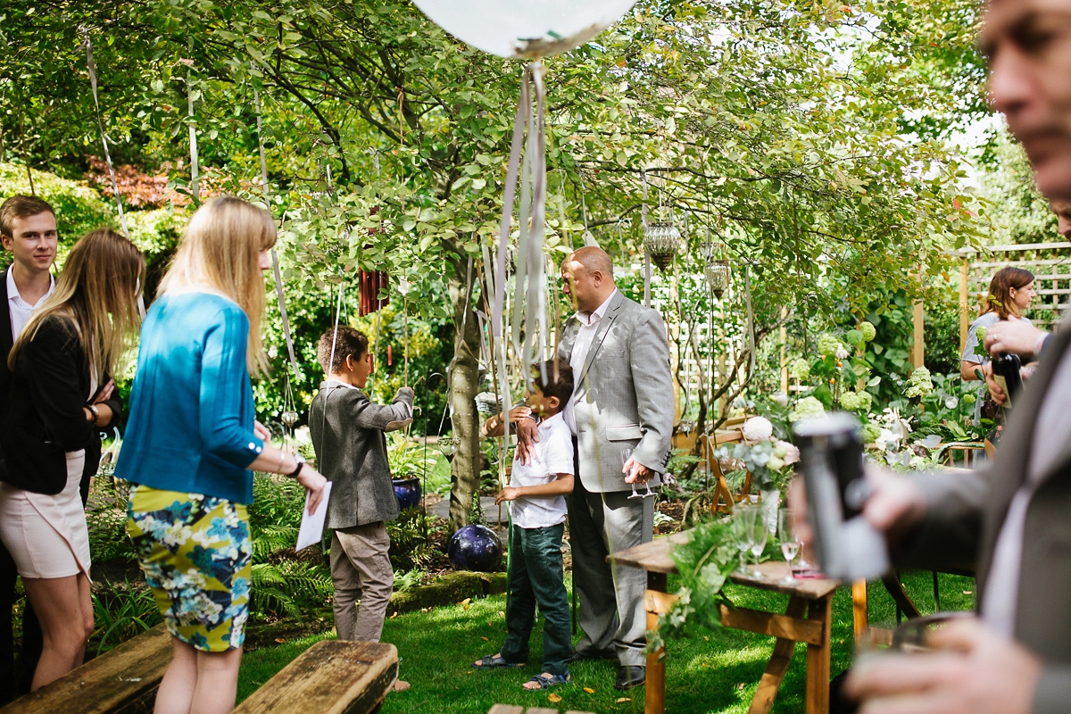 23 A pale blue dress for an intimate family garden wedding