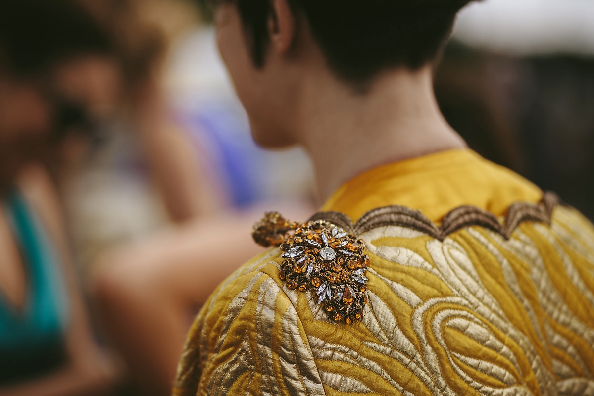 23 A yellow 1970s vintage Christian Dior gown and cape for a modern alternative Scottish wedding