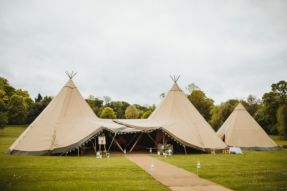 24 A Charlie Brear bride for a country house tipi wedding